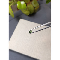 0.67 Ct. Green Cabochon Sapphire from Ceylon (Sri Lanka) Life Style