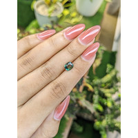 1.08 Ct. Bluish Green Sapphire from Madagascar Life Style