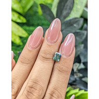 1.58 Ct. Bluish Green Sapphire from Madagascar Life Style