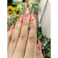 0.64 Ct. Green Sapphire from Madagascar Life Style