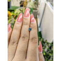 0.87 Ct. Greenish Blue Sapphire from Madagascar Life Style