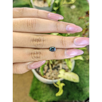 0.95 Ct. Greenish Blue Sapphire from Madagascar Life Style