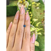 0.75 Ct. Greenish Blue Sapphire from Madagascar Life Style