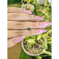 0.65 Ct. Green Sapphire from Madagascar Life Style