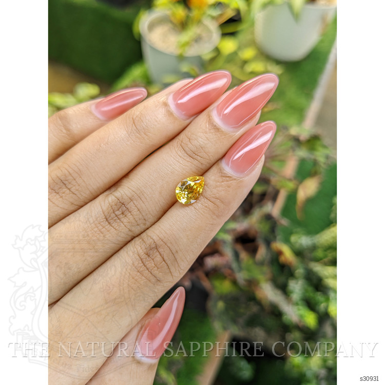 2.09 Ct. Orangish Yellow Sapphire from Ceylon (Sri Lanka)