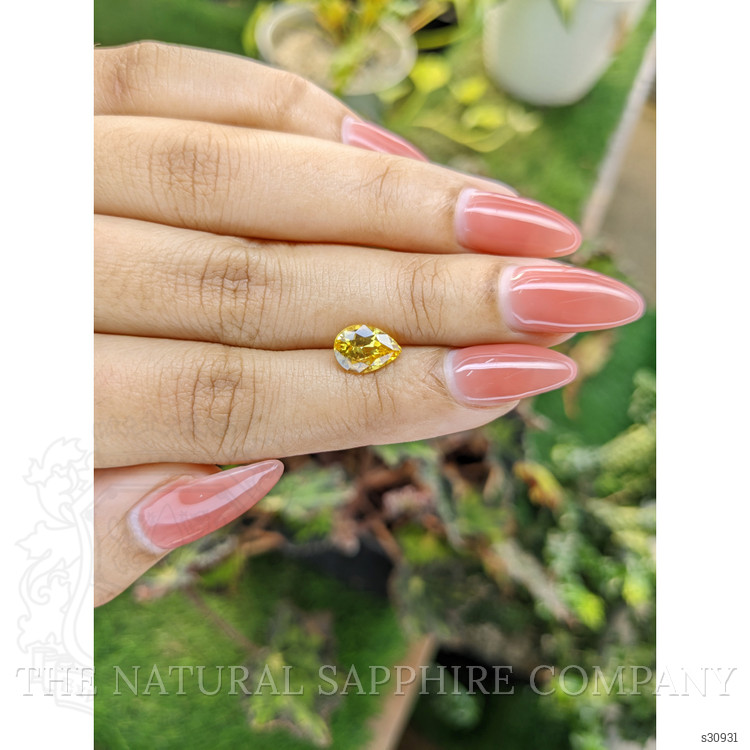2.09 Ct. Orangish Yellow Sapphire from Ceylon (Sri Lanka)