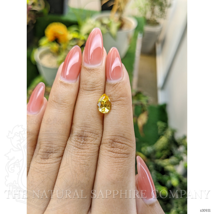 2.09 Ct. Orangish Yellow Sapphire from Ceylon (Sri Lanka)