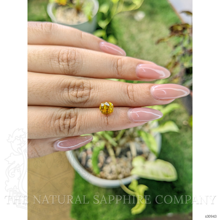2.11 Ct. Orangish Yellow Sapphire from Ceylon (Sri Lanka)