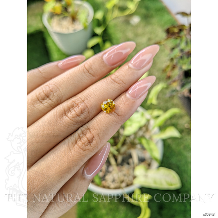 2.11 Ct. Orangish Yellow Sapphire from Ceylon (Sri Lanka)