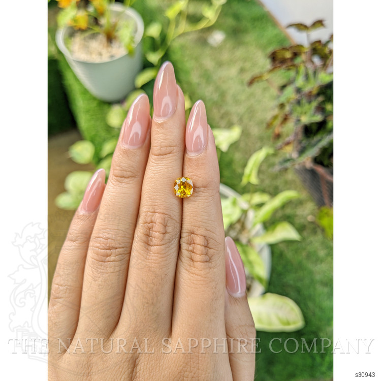 2.11 Ct. Orangish Yellow Sapphire from Ceylon (Sri Lanka)
