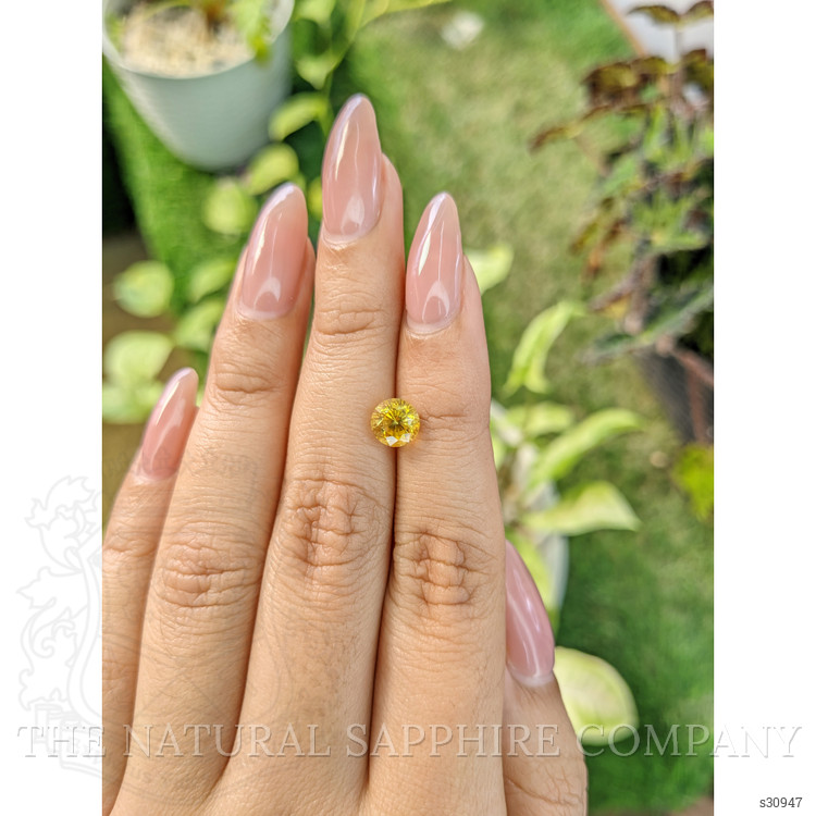 1.89 Ct. Orangish Yellow Sapphire from Ceylon (Sri Lanka)