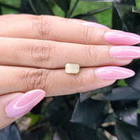 1.56 Ct. Yellowish Green Sapphire from Madagascar Life Style