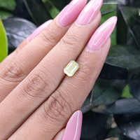 1.56 Ct. Yellowish Green Sapphire from Madagascar Life Style