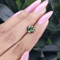 2.10 Ct. Yellowish Green Sapphire from Madagascar Life Style