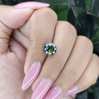 2.10 Ct. Yellowish Green Sapphire from Madagascar Life Style