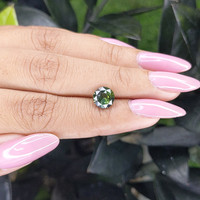 2.10 Ct. Yellowish Green Sapphire from Madagascar Life Style