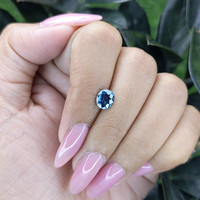 1.23 Ct. Greenish Blue Sapphire from Madagascar Life Style