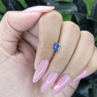 0.60 Ct. Greenish Blue Sapphire from Madagascar Life Style