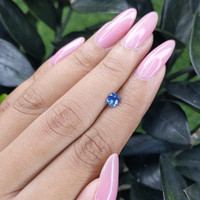 0.59 Ct. Blue Sapphire from Madagascar Life Style