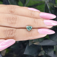 1.56 Ct. Bluish Green Sapphire from Madagascar Life Style