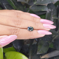 2.02 Ct. Bluish Green Sapphire from Madagascar Life Style