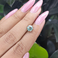 1.55 Ct. Bluish Green Sapphire from Madagascar Life Style