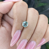 1.55 Ct. Bluish Green Sapphire from Madagascar Life Style
