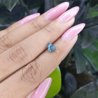 1.02 Ct. Bluish Green Sapphire from Madagascar Life Style