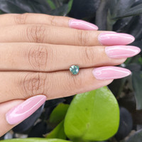 0.72 Ct. Green Sapphire from Madagascar Life Style