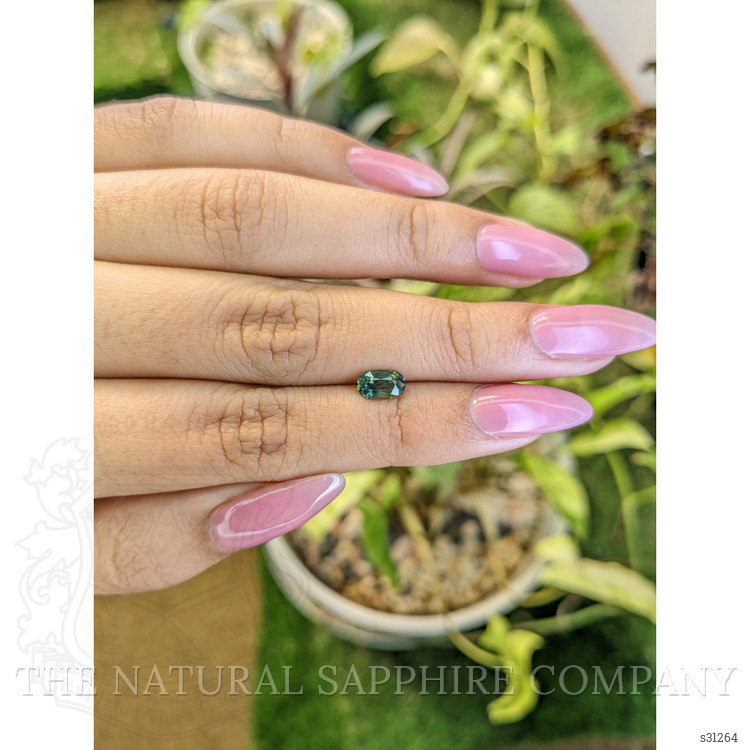 0.97 Ct. Yellowish Green Sapphire from Madagascar