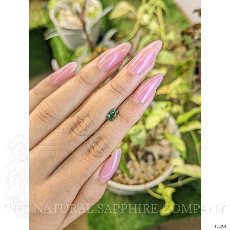 0.97 Ct. Yellowish Green Sapphire from Madagascar