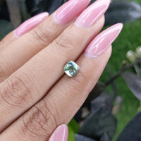 1.13 Ct. Yellowish Green Sapphire from Madagascar Life Style