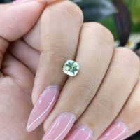 1.13 Ct. Yellowish Green Sapphire from Madagascar Life Style