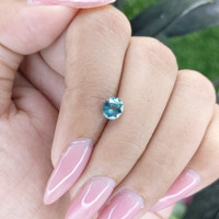 1.01 Ct. Bluish Green Sapphire from Madagascar Life Style