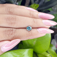 1.01 Ct. Bluish Green Sapphire from Madagascar Life Style