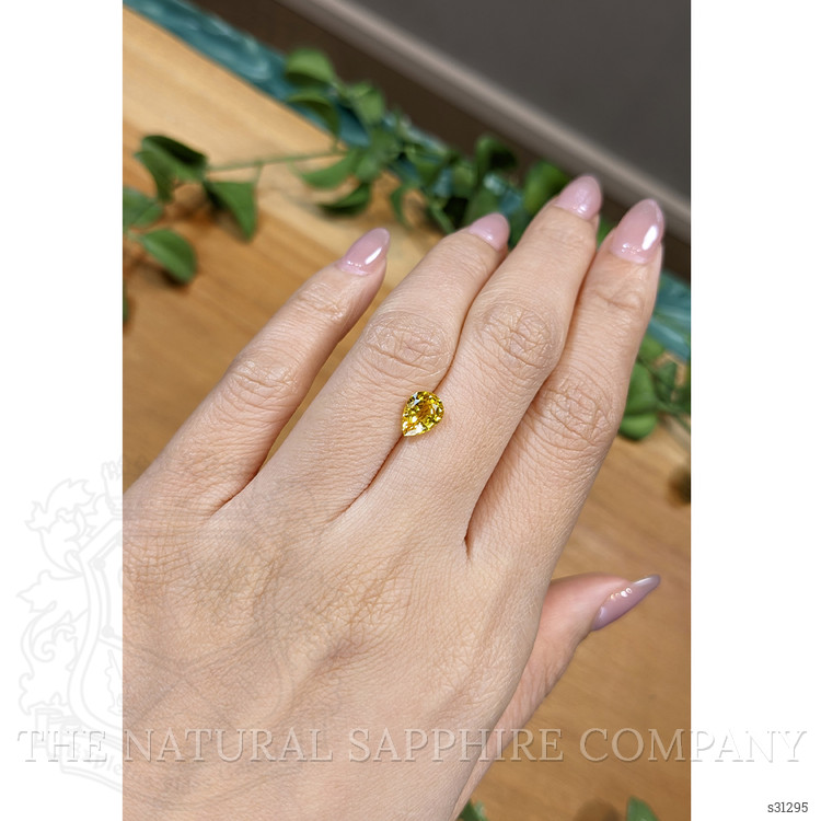 1.37 Ct. Orangish Yellow Sapphire from Ceylon (Sri Lanka)