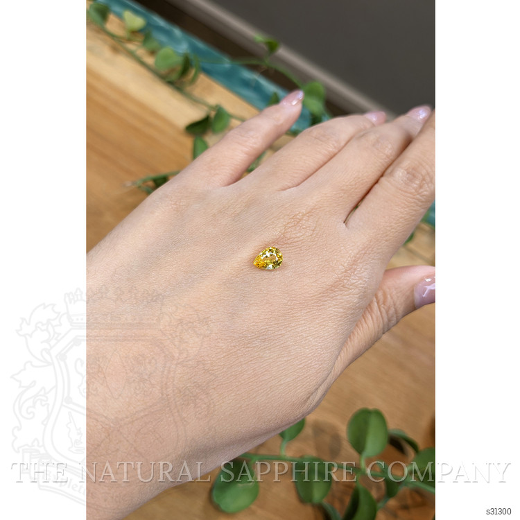 1.25 Ct. Orangish Yellow Sapphire from Ceylon (Sri Lanka)