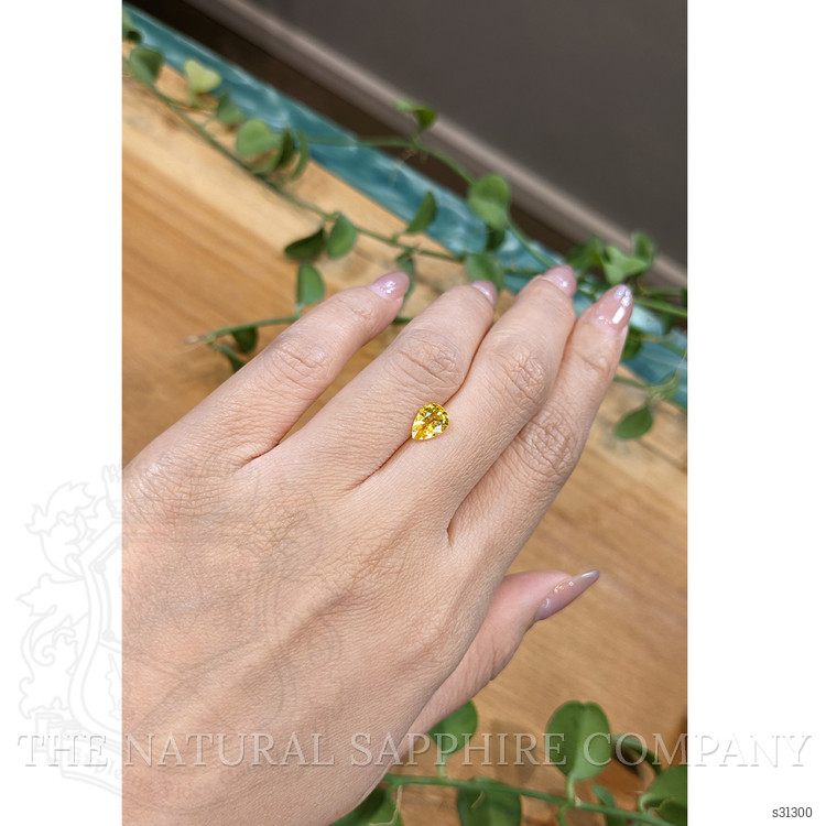 1.25 Ct. Orangish Yellow Sapphire from Ceylon (Sri Lanka)