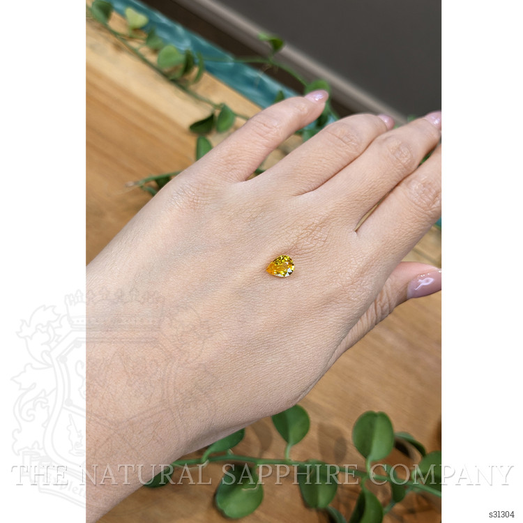 1.15 Ct. Orangish Yellow Sapphire from Ceylon (Sri Lanka)