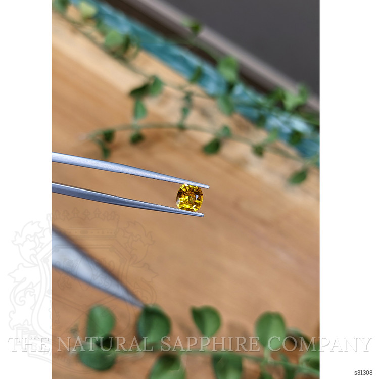 0.96 Ct. Yellowish Orange Sapphire from Ceylon (Sri Lanka)