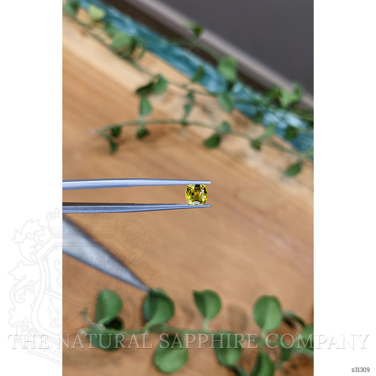 1.08 Ct. Orangish Yellow Sapphire from Ceylon (Sri Lanka)