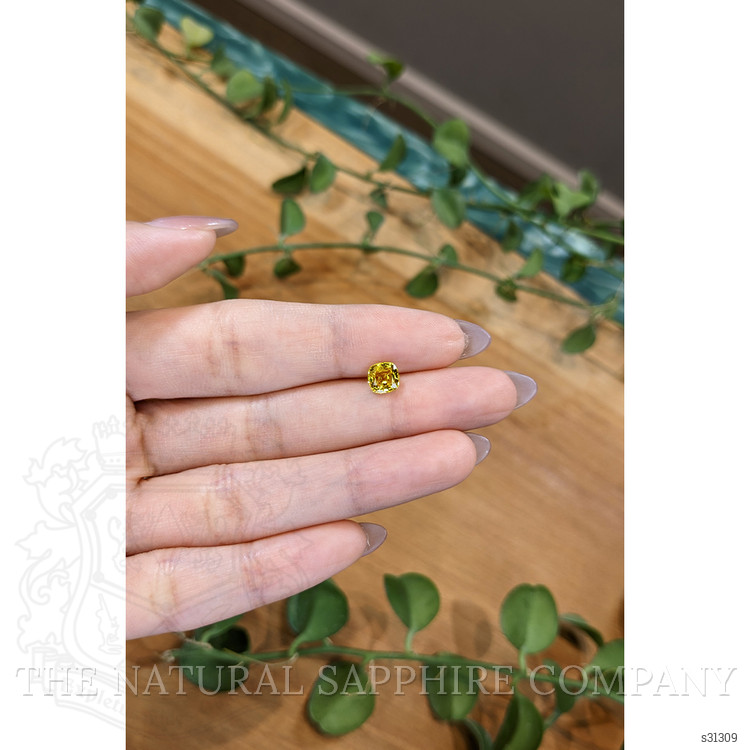 1.08 Ct. Orangish Yellow Sapphire from Ceylon (Sri Lanka)