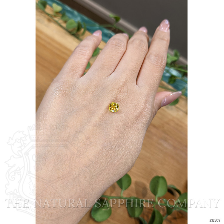 1.08 Ct. Orangish Yellow Sapphire from Ceylon (Sri Lanka)