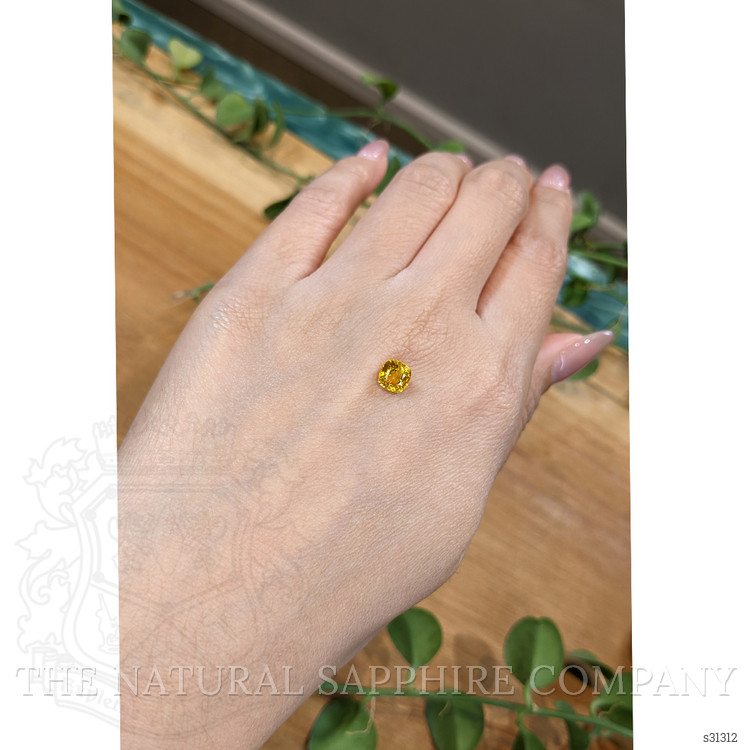 1.31 Ct. Orangish Yellow Sapphire from Ceylon (Sri Lanka)