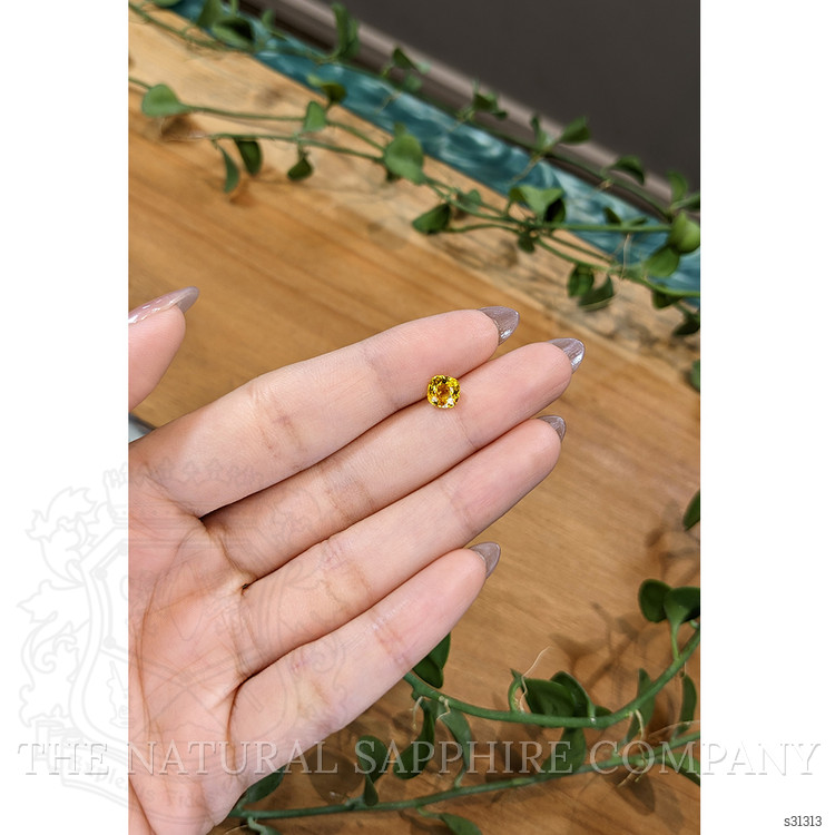 1.12 Ct. Orangish Yellow Sapphire from Ceylon (Sri Lanka)