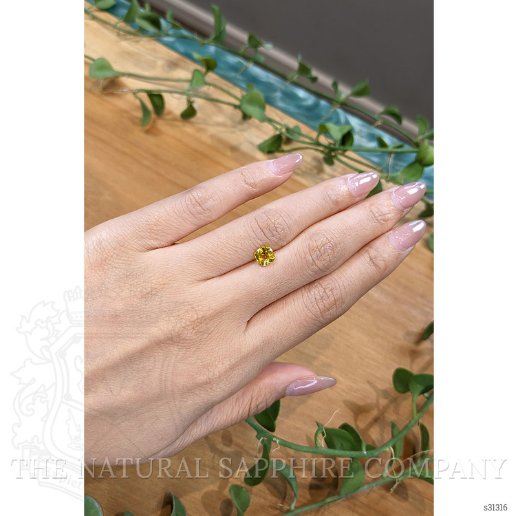 1.29 Ct. Orangish Yellow Sapphire from Ceylon (Sri Lanka)