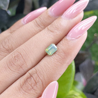 1.05 Ct. Yellowish Green Sapphire from Madagascar Life Style