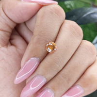1.07 Ct. Peach Sapphire from Madagascar Life Style
