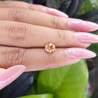 1.07 Ct. Peach Sapphire from Madagascar Life Style