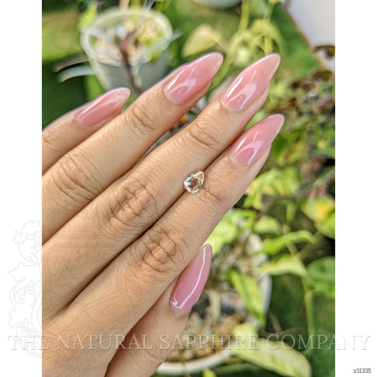 0.67 Ct. Peach Sapphire from Ceylon (Sri Lanka)